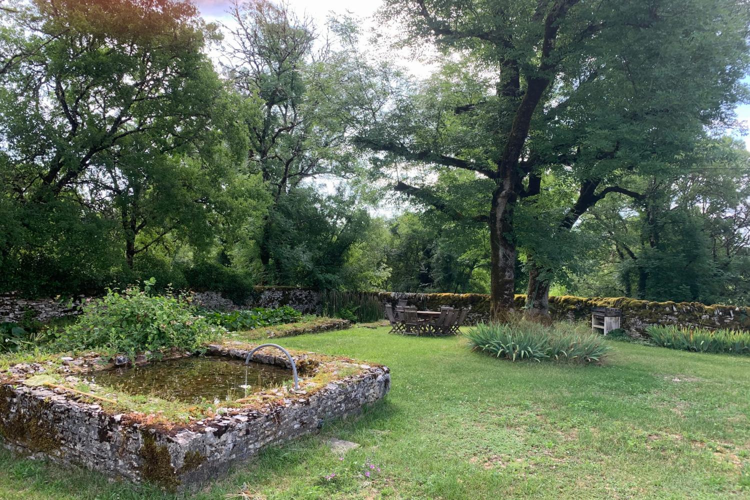 Garden in France with fish pond