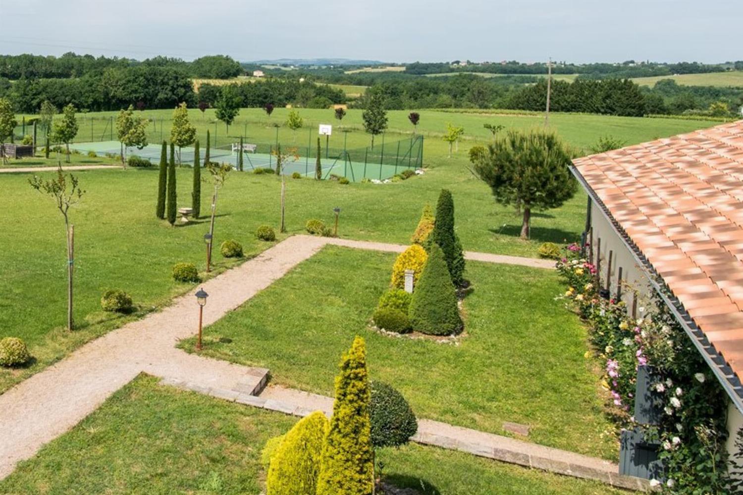 Garden with private tennis court