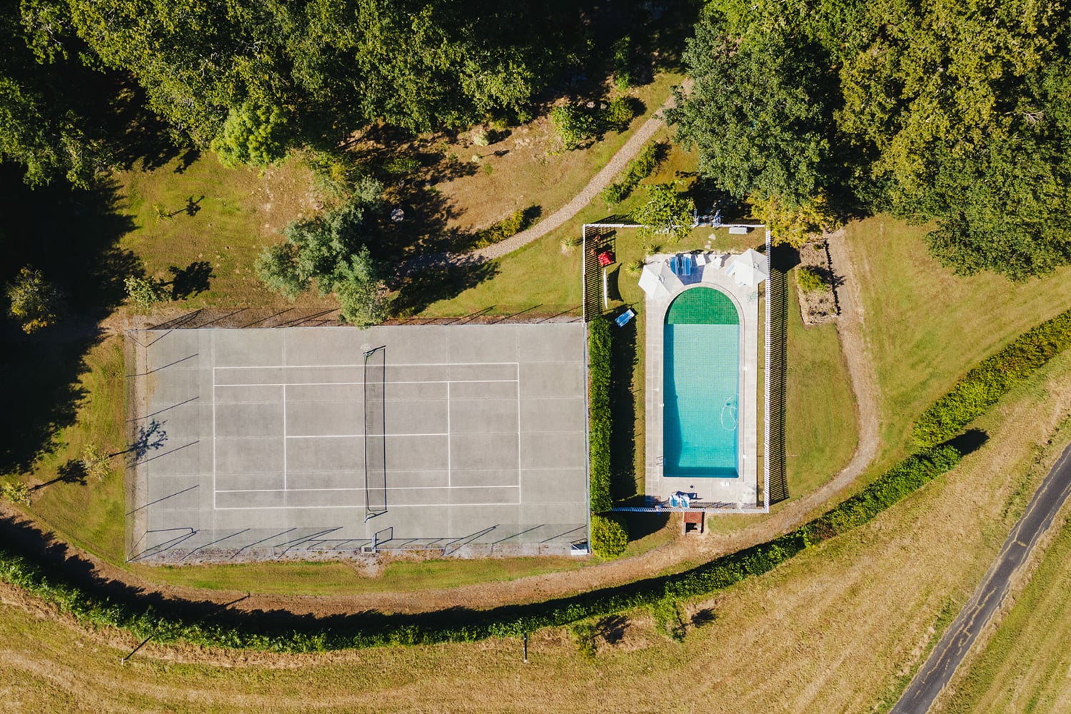 Private tennis court and private pool