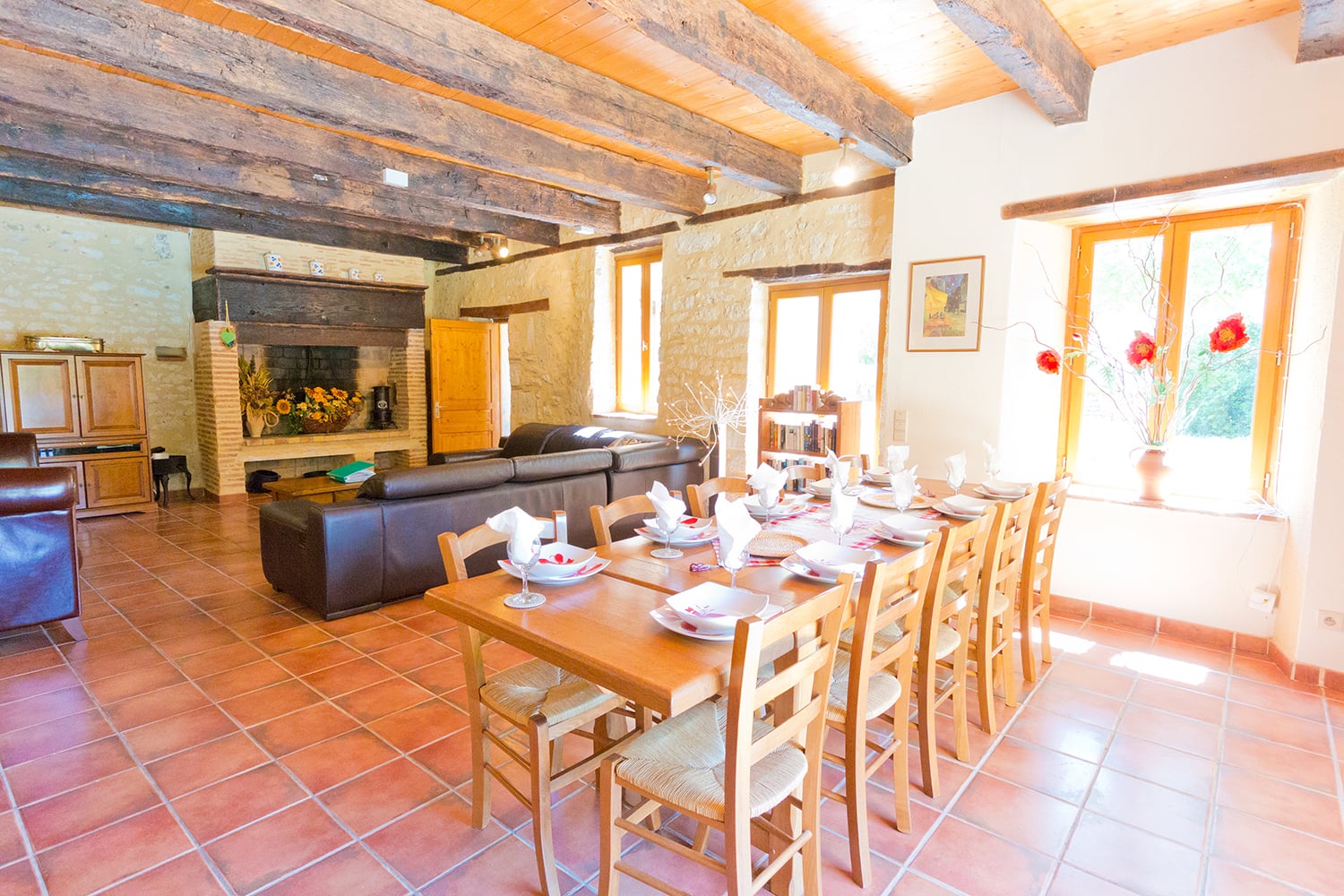 Open-plan living and dining room in Lot-et-Garonne holiday home