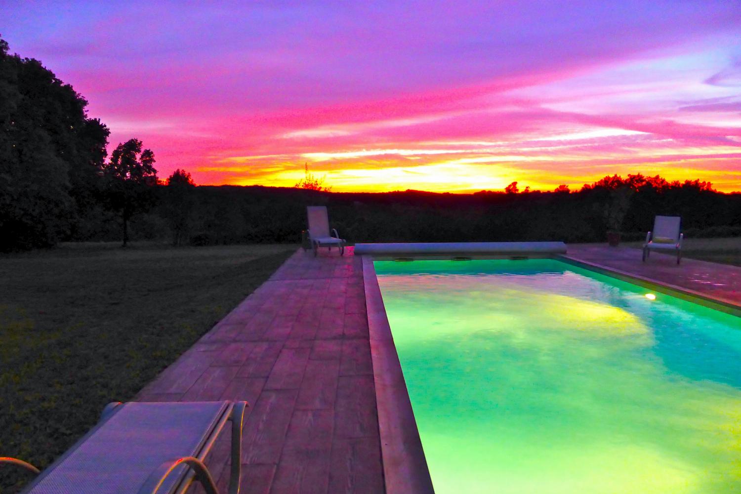 Private heated pool at night