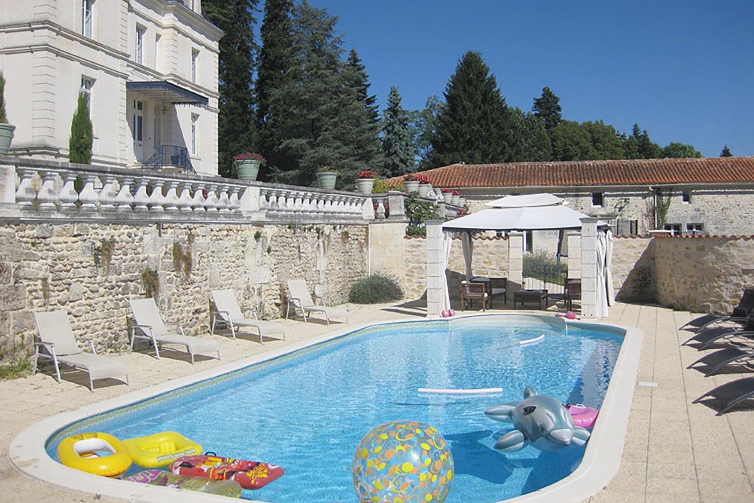 Holiday château in Charente with private heated pool