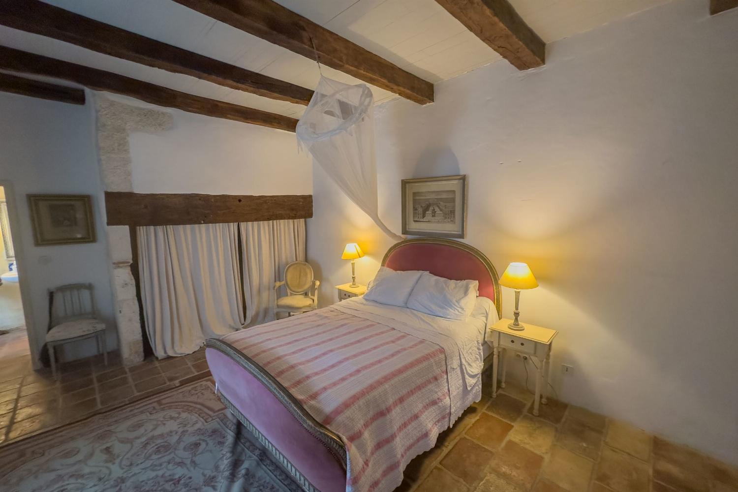 Coach house bedroom | Holiday accommodation in Tarn-en-Garonne