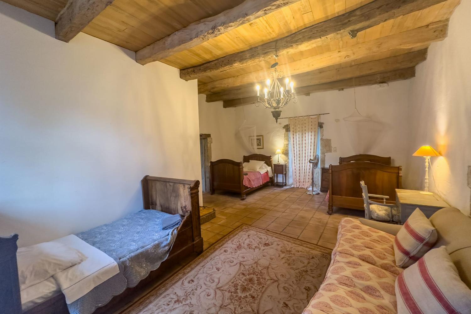 Coach house bedroom | Holiday accommodation in Tarn-en-Garonne