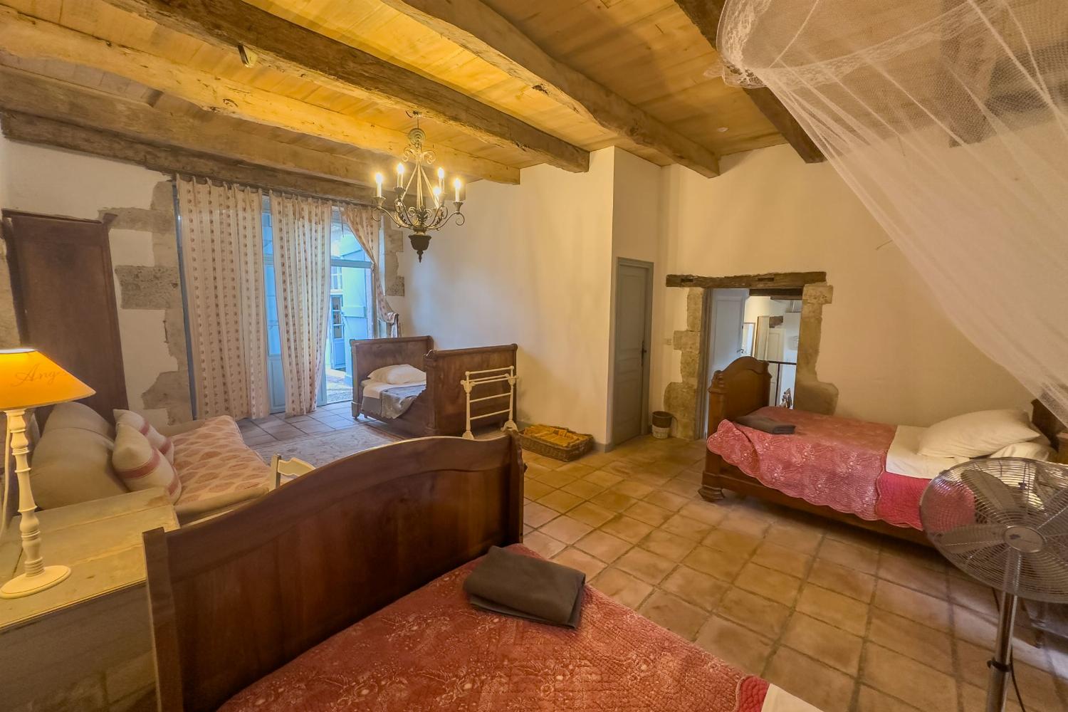 Coach house bedroom | Holiday accommodation in Tarn-en-Garonne