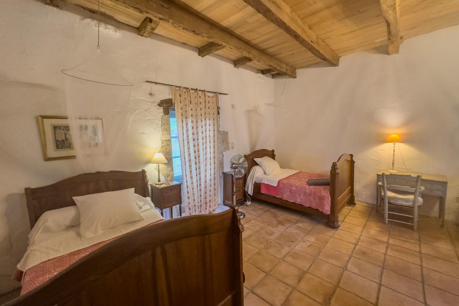 Coach house bedroom | Holiday accommodation in Tarn-en-Garonne